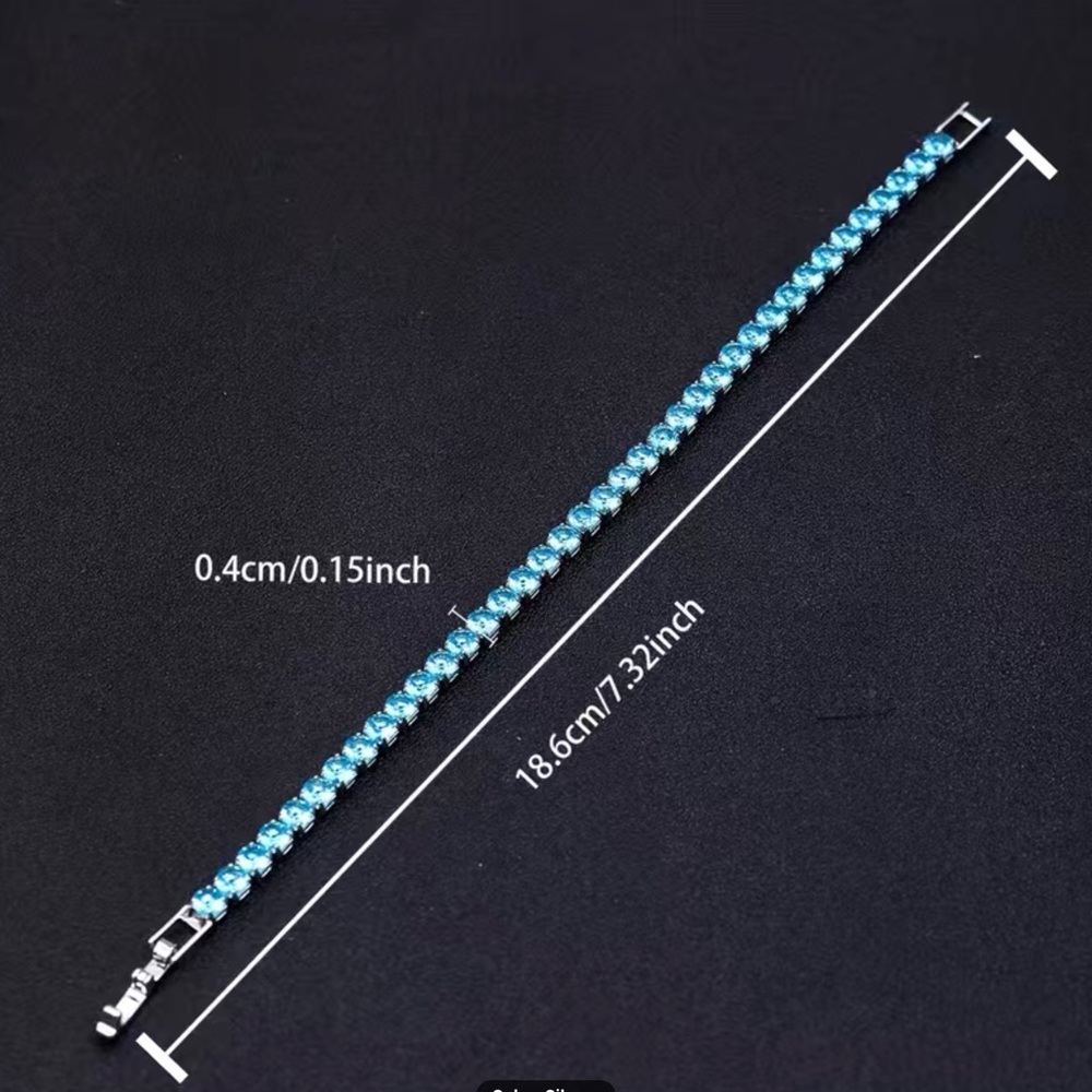 Beautiful Round Blue Topaz Bracelet In White Gold - Picture 12 of 12
